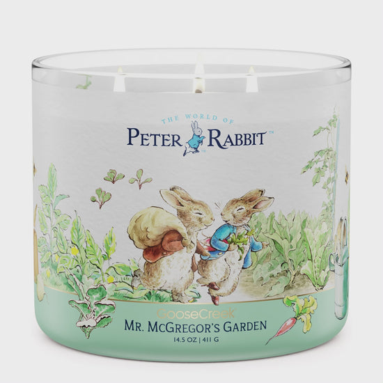 Load and play video in Gallery viewer, Mr McGregor&amp;#39;s Garden Peter Rabbit 3-Wick Candle
